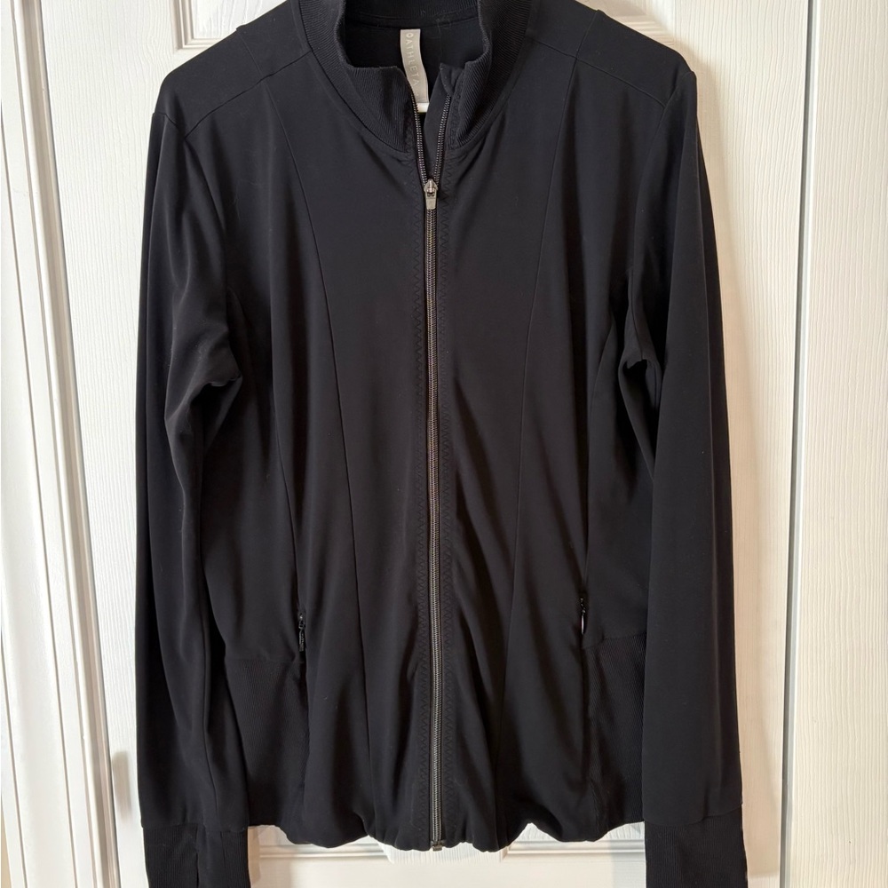 Athleta full-zip athletic jacket in black. Size L, Jacket hits at hip. $29